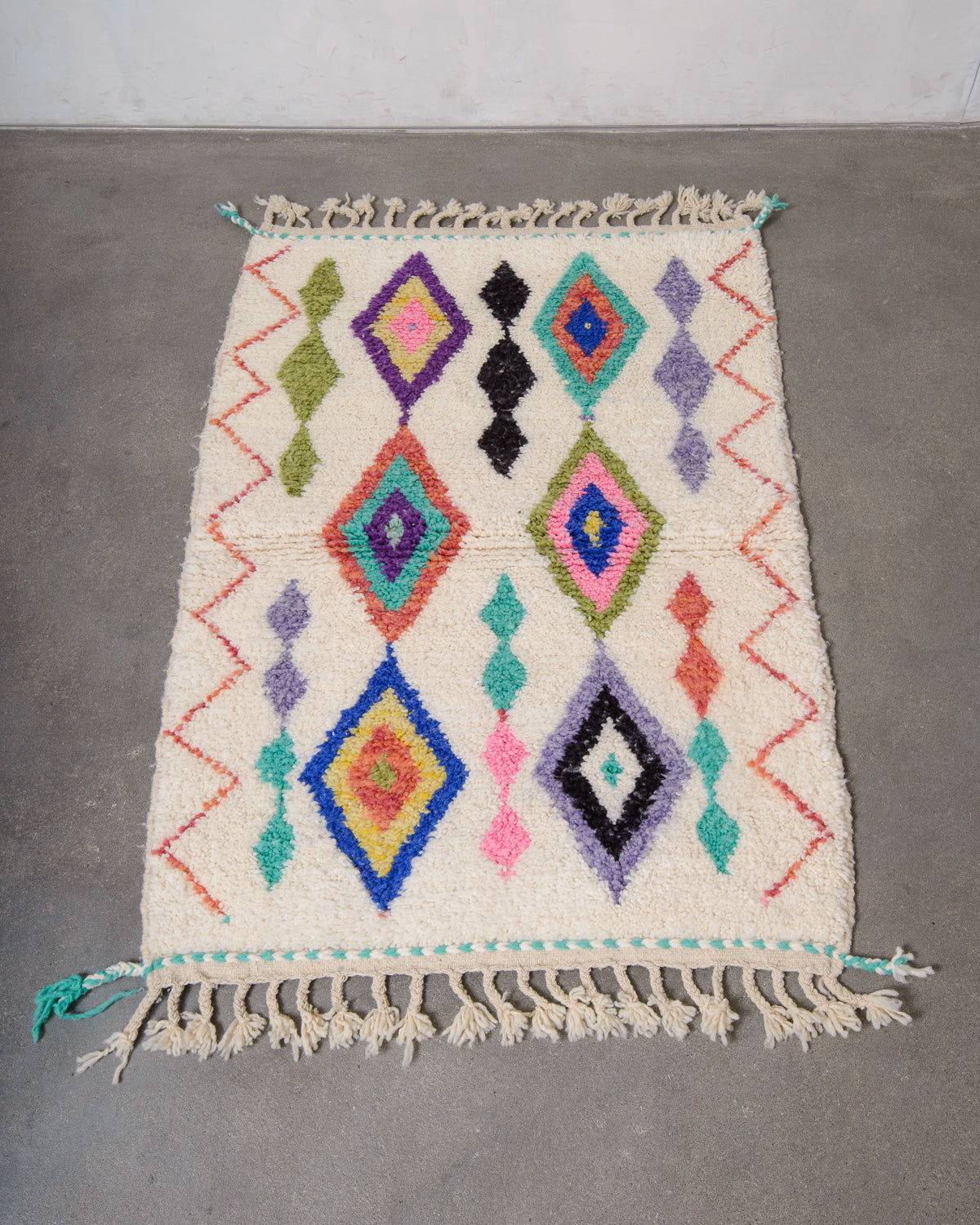 Modern, designer, handcrafted Berber rug from Morocco. Beniourain carpet with beautiful colours and patterns and fluffy wool texture.